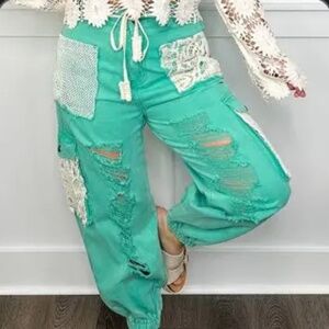 POL distressed denim patched joggers